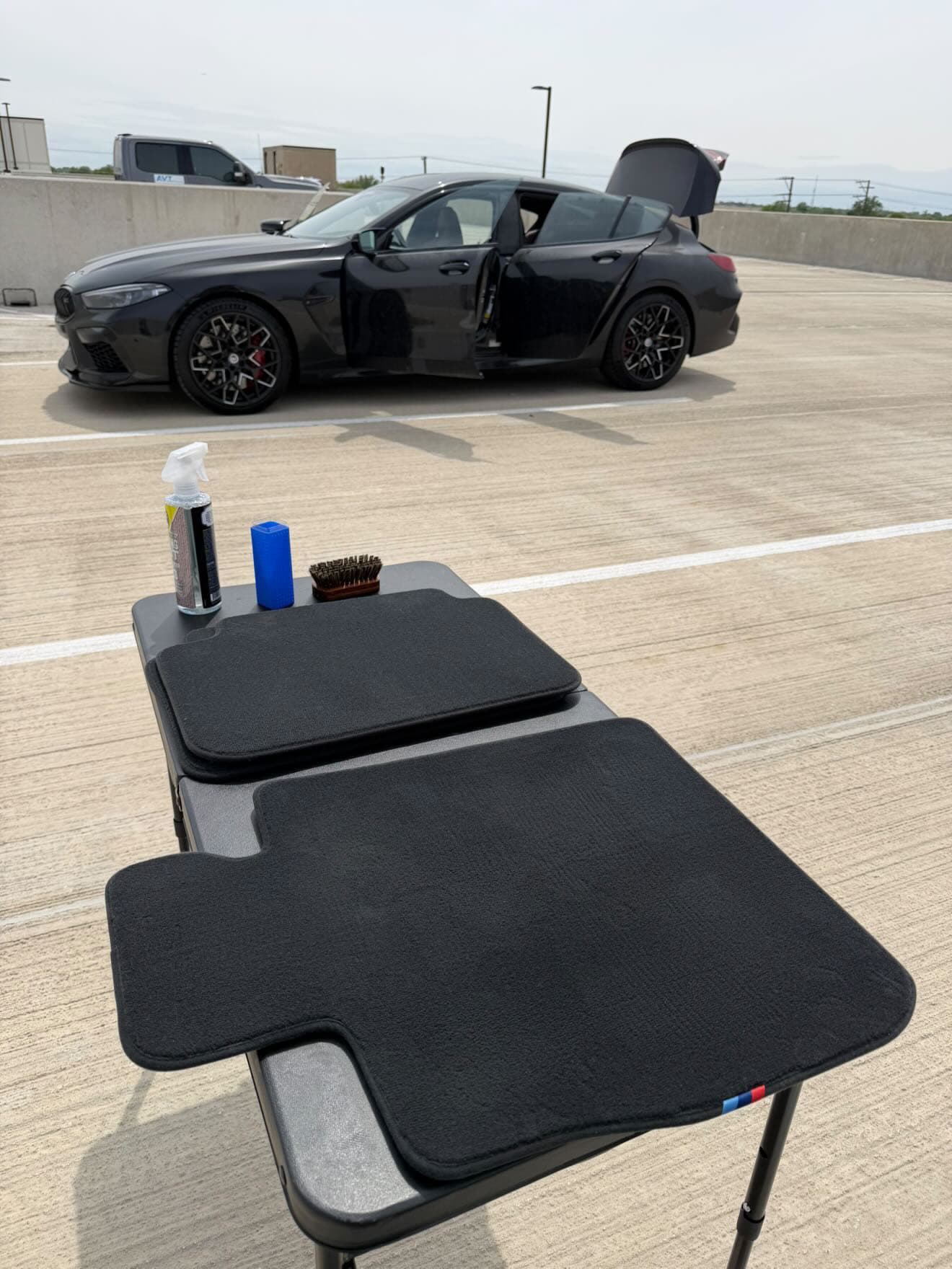 BMW M8 freshly cleaned floor mats
